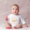Some Bunny Is One Birthday Easter Onesie® Personalized First Birthday Outfit Custom Name Pastel Colors